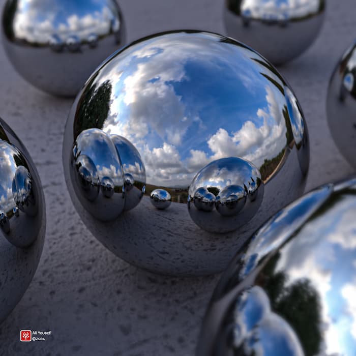 طرح گرافیکی خلاقانه رندر سه‌بعدی گوی نقره‌ای روی آسفالت | نرم افزار ادوبی دیمنشن